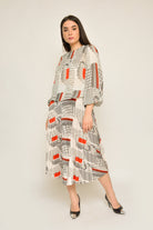 نتشي بلوزة منقوشة بكم طويل منفوخة نسائي