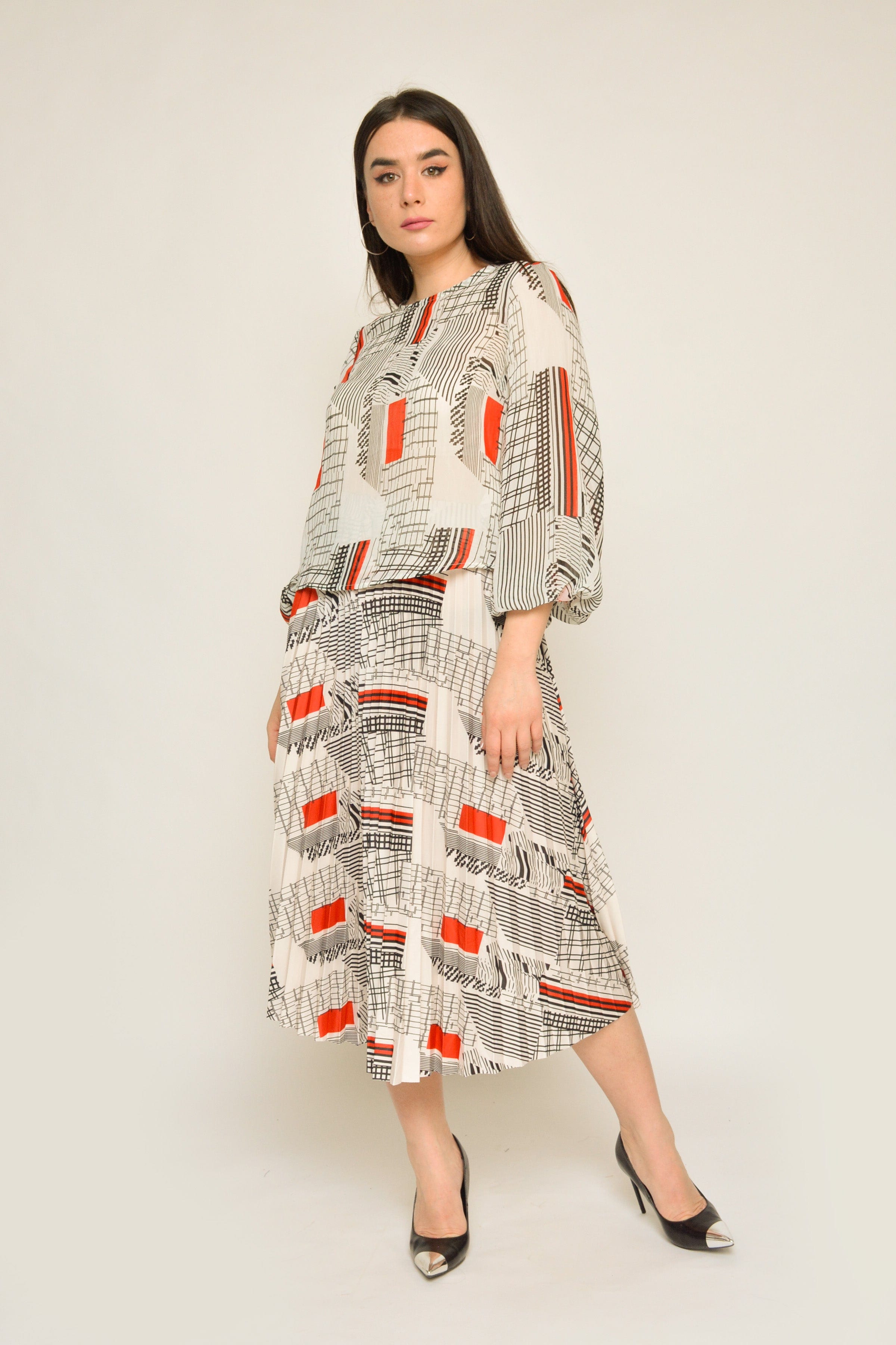 نتشي بلوزة منقوشة بكم طويل منفوخة نسائي