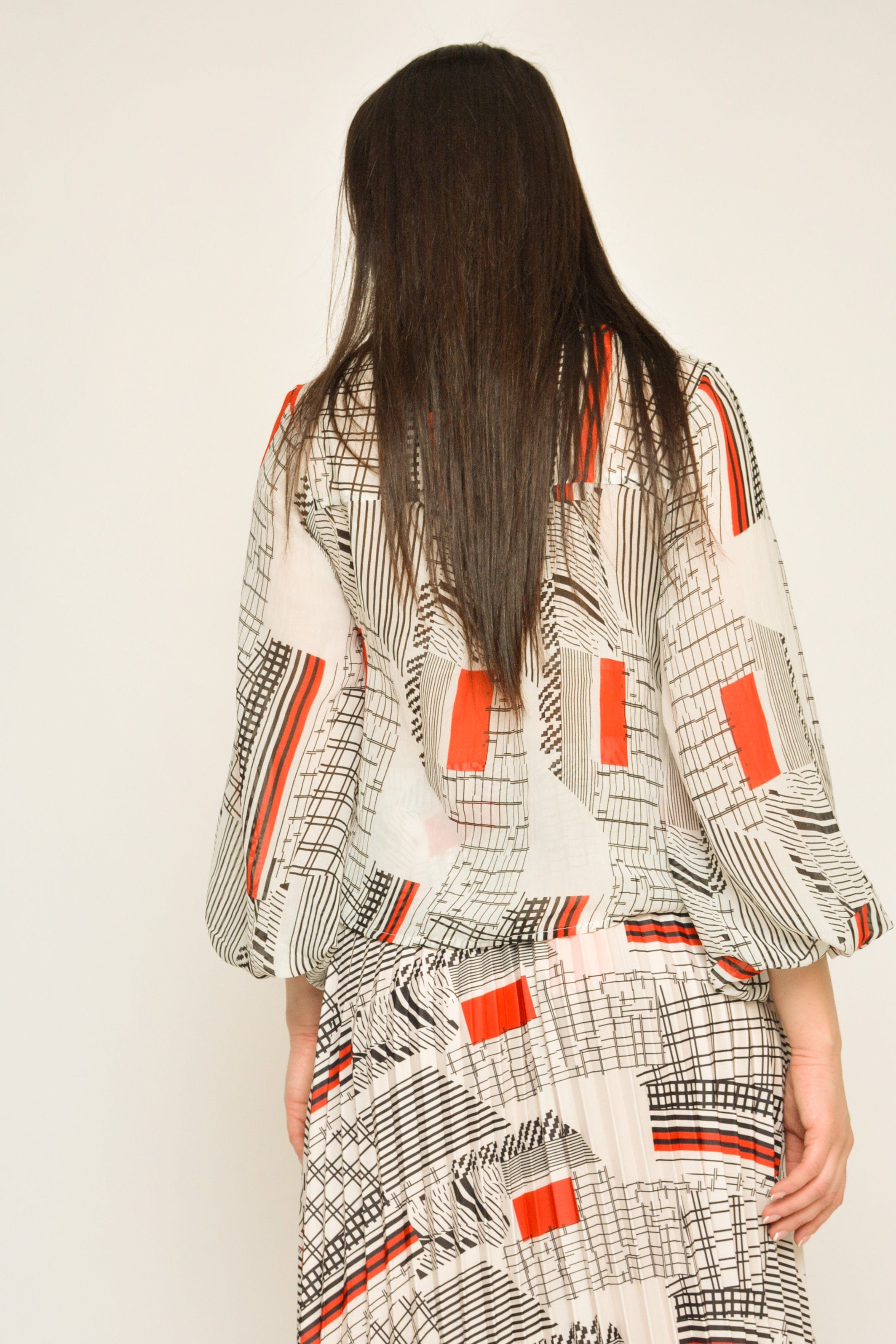 نتشي بلوزة منقوشة بكم طويل منفوخة نسائي