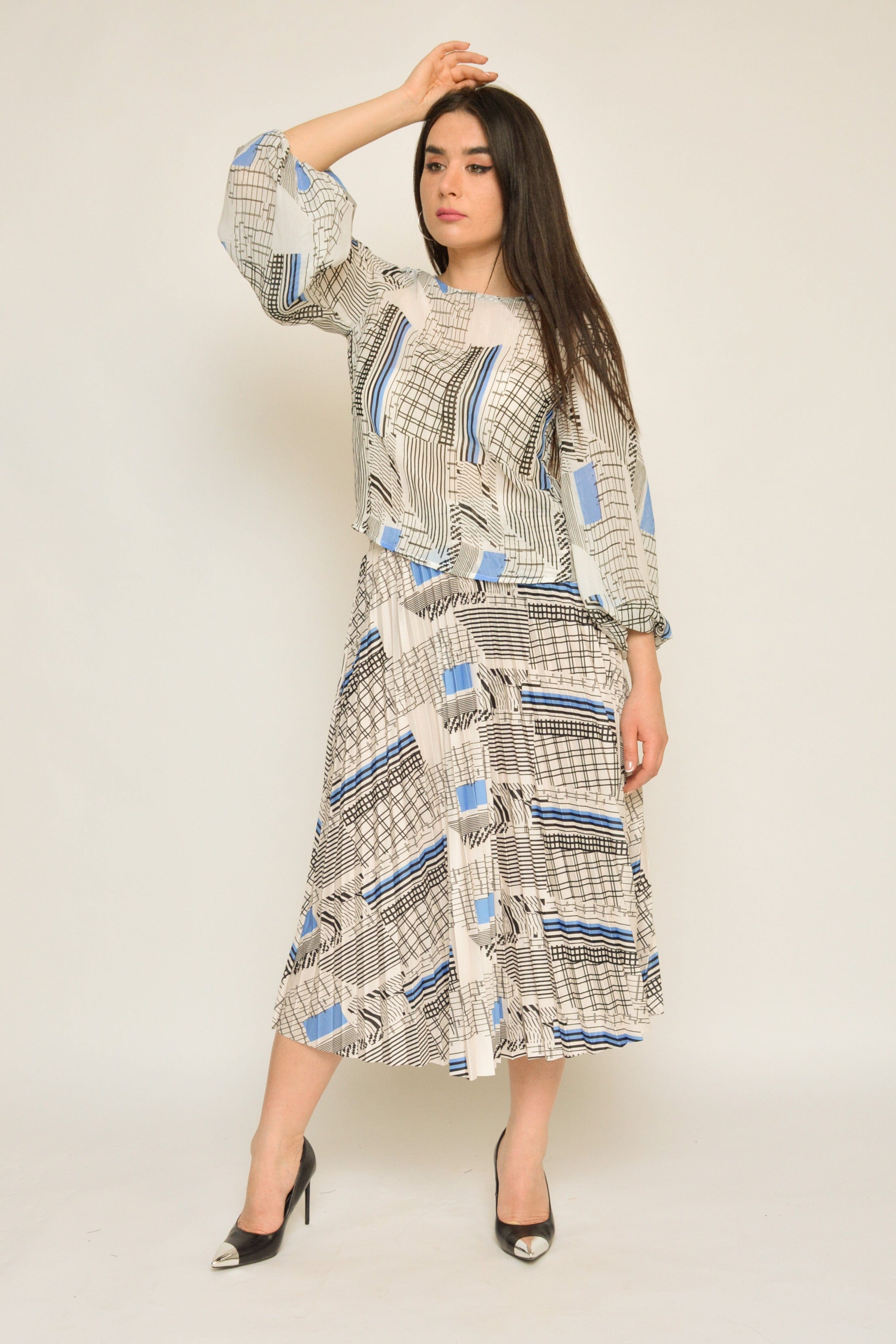 نتشي بلوزة منقوشة بكم طويل منفوخة نسائي