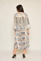 نتشي بلوزة منقوشة بكم طويل منفوخة نسائي