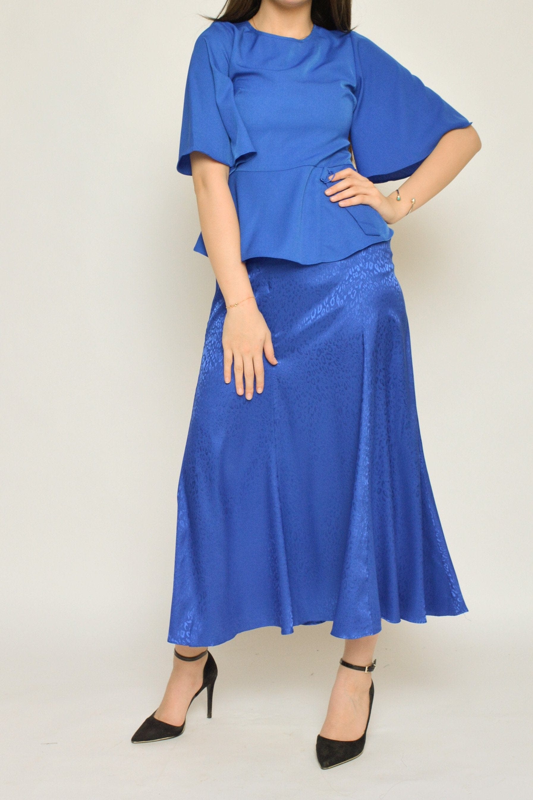 نتشي بلوزة سادة مخصر كم قصير واسع نسائي