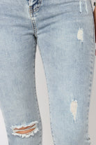 نتشي بنطلون جينز مقطع بسحاب وزرار وجيوب سكيني طويل نسائي