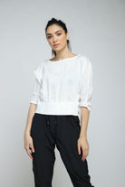 نتشي بلوزة قصيرة مخصرة بأزرار على الجانبين كم طويل نسائي