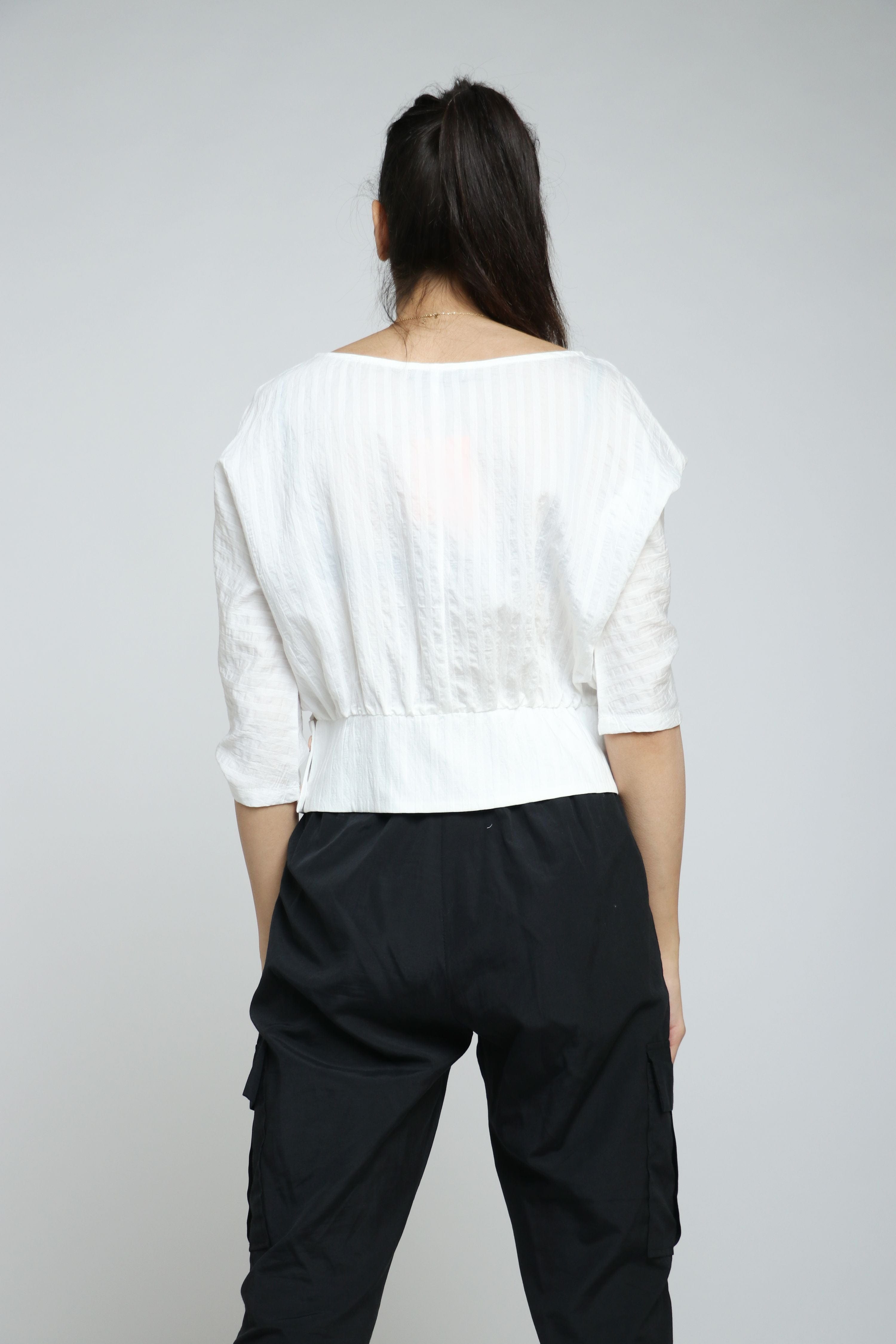 نتشي بلوزة قصيرة مخصرة بأزرار على الجانبين كم طويل نسائي