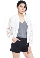 نتشي سترة مخرمة بسحاب بأكمام طويلة