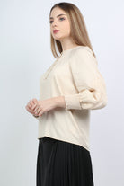 نتشي بلوزة بأكمام طويلة مزينة بجزء مطاطي