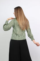 نتشي بلوزة مشجرة برقبة كلوش كم طويل واسع نسائي