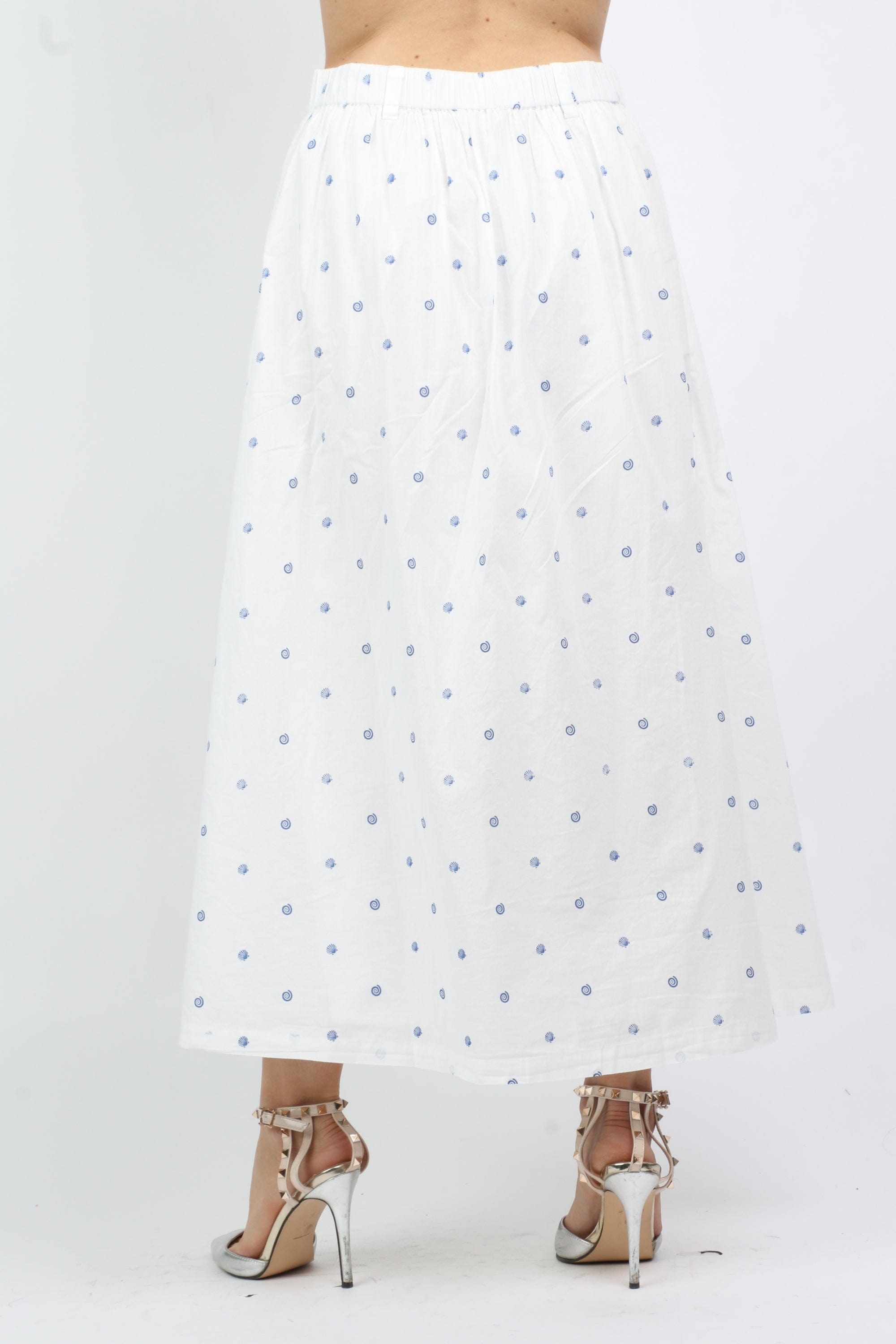 داليدرس تنورة ميدي منقطة مفتوحة من الأمام أبيض