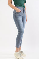 ميكا بنطلون هاي ويست سكيني أزرار بجيوب أمامية طويل نسائي