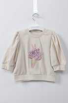 جينجرسنابس بلوفر بكم منفوخ مزينة بترتر علي الصدر بيج