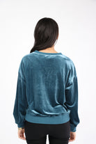 ميكا بلوزة سادة مطرزة بالخيط بأكمام طويلة