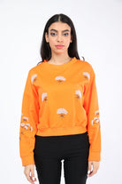 ميكا بلوزة بأكمام طويلة مزينة بورود خصر مرتفع