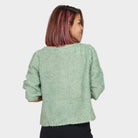 نتشي بلوزة ريش برقبة دائرية نص كم نسائي