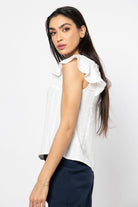 نتشي بلوزة رسمية مخططة بالطول وبأكتاف مكشكشة نسائي