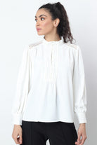 نتشي بلوزة أزرار أمامية بياقة صغيرة كم طويل واسعة بأساور نسائي