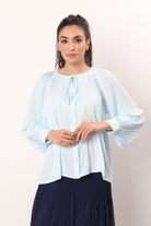 نتشي بلوزة كلوش مع رباط وكم طويل نسائي