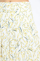 نتشي تنورة ميدي منقوشة بورود صغيرة ناعمة