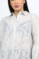 نتشي قميص نسائي شفاف بأكمام منفوخة