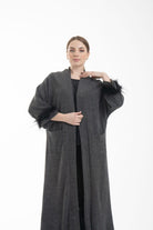 نتشي بالطو نسائي بأكمام طويلة مزين بفرو وجيوب أمامية