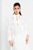 نتشي بلوزة سادة سواريه كم طويل بف نسائي مع ربطة عنق