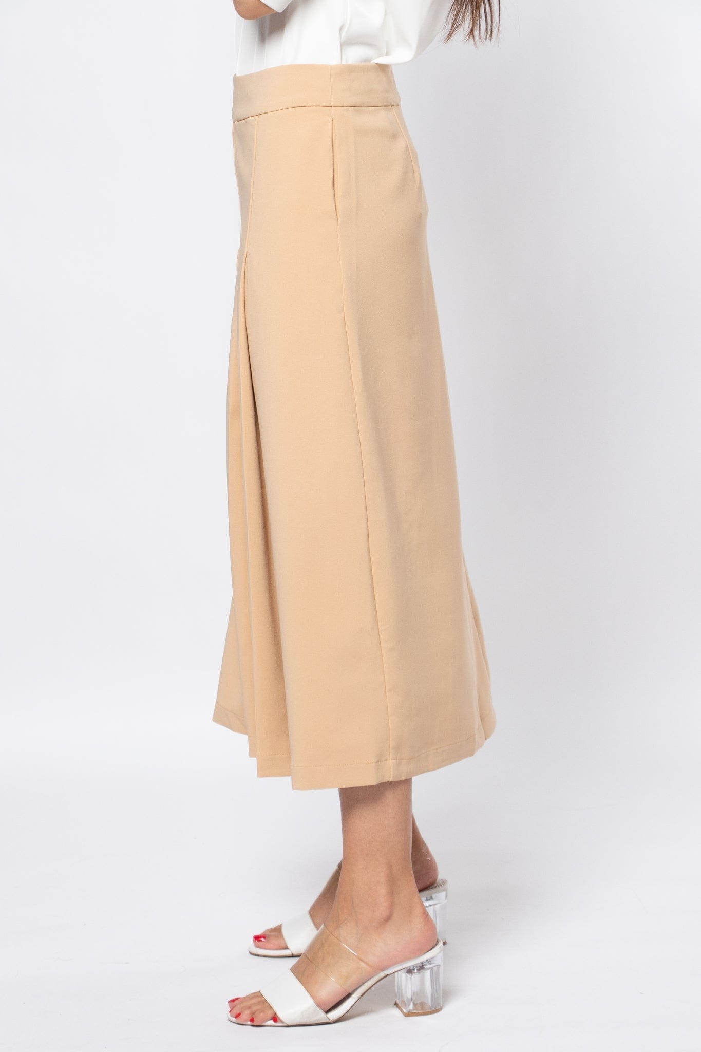 نتشي تنورة ميدي رسمية بكسرات سادة وحزام خصر