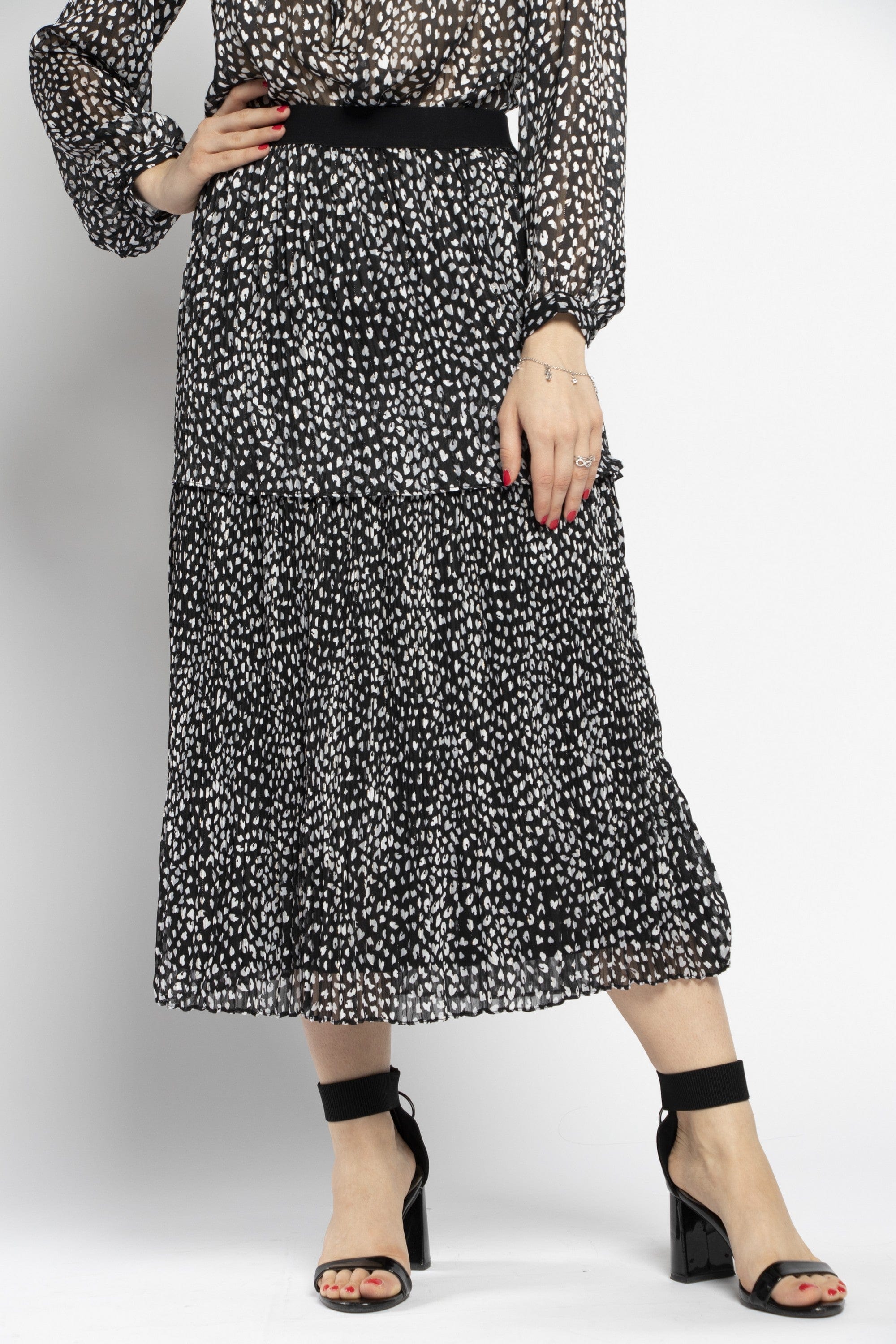 نتشي تنورة ميدي واسعه من طبقتين مطبوعة بنقشة جلد النمر