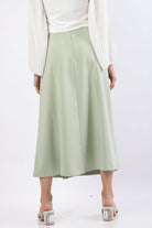 نتشي تنورة ميدي سادة بطيات عريضة محكمة بزرار