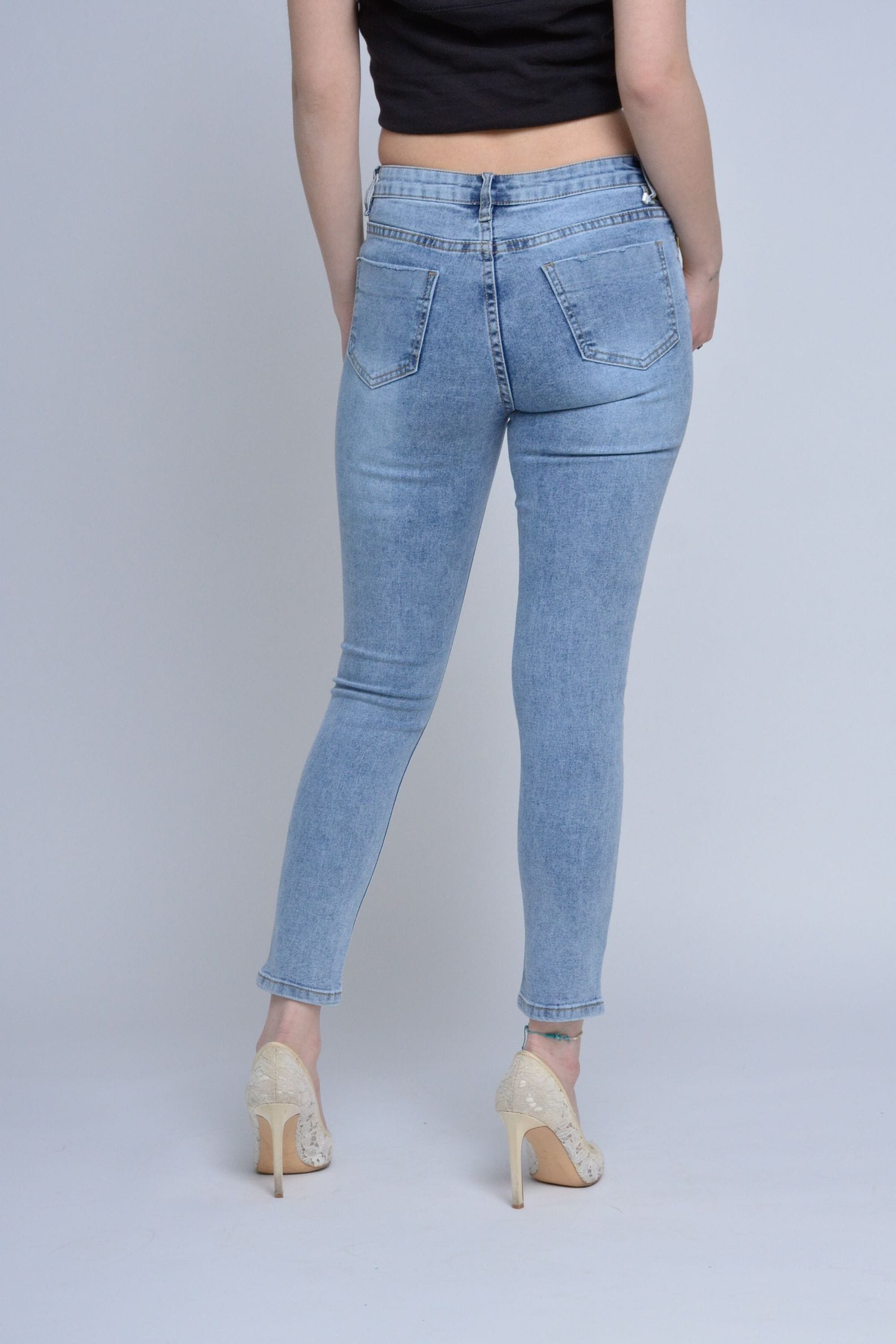 ميكا بنطلون جينز مقطع ومطرز بسحاب وزرار وجيوب طويل نسائي