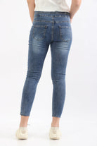 ميكا بنطلون هاي ويست طويل سكيني بأزرار نسائي