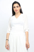 ميكا بلوزة بدي مضلع بأكمام منفوخة نسائي