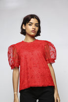 ميكا بلوزة بأكمام قصيرة شفافة بياقة دائرية