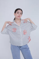 ميكا بلوزة مخططة بالطول 3/4 كم نسائي