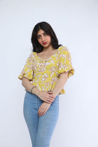 ميكا بلوزة مشجرة مخصرة مفتوحة من الصدر 3/4 كم بف نسائي