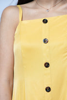 ميكا فستان ميدي بدون أكمام بحمالات رفيعة وأزرار أمامية