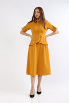 ميكا فستان ميدي بأزرار أمامية كم طويل