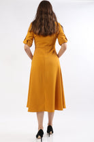 ميكا فستان ميدي بأزرار أمامية كم طويل