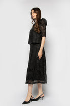 ميكا تنورة ميدي بنمط مشجر شفاف