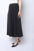 ميكا تنورة ميدي مزينة بكسرات عريضة