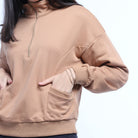 ميكا بلوزة سادة بسحاب طويل بجيوب جانبية بأكمام طويلة