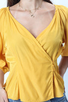 ميكا بلوزة لف بأزرار جانبية 3/4 كم