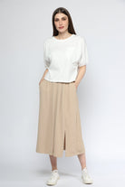 ميكا بلوزة سادة بأكمام قصيرة بجيب على الصدر