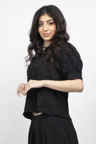 ميكا بلوزة رسمية قصيرة من الأمام وطويلة من الخلف نص كم منفوخ نسائي أسود