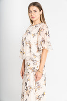 ميكا بلوزة منقوشة كم فراشة