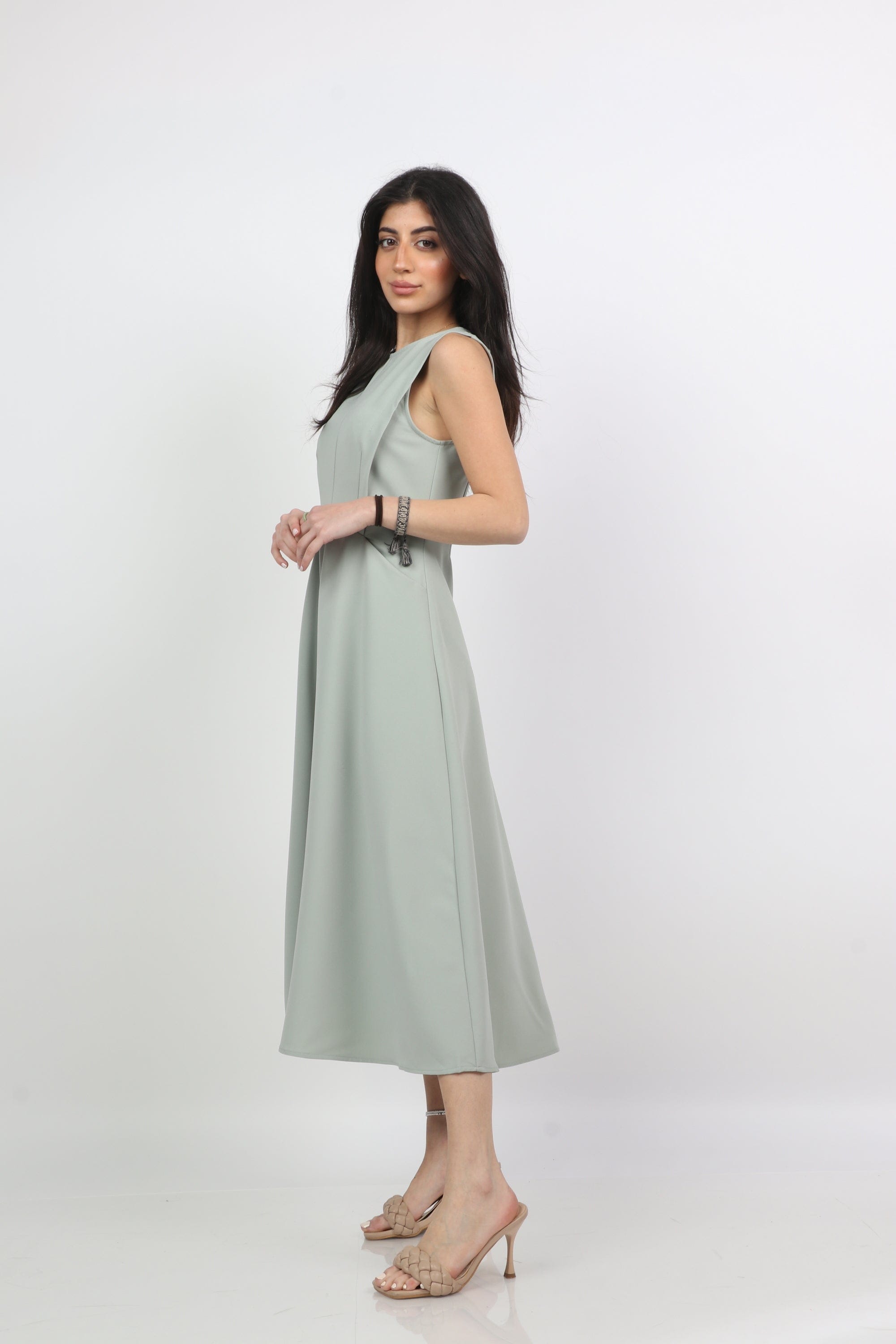 ميكا فستان ميدي سادة واسع بجيوب بدون كم