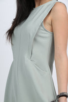 ميكا فستان ميدي سادة واسع بجيوب بدون كم