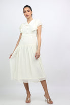 نتشي فستان ميدي بأكمام قصيرة فراشة بأزرار أمامية