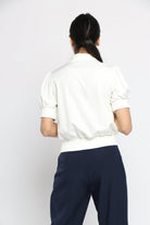 نتشي قميص نسائي نايلون بجيوب وأزرار أمامية وكم قصير بف نسائي