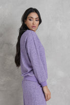 نتشي بلوزة بتطريز بأزراز برقبة دائرية وكم طويل نسائي