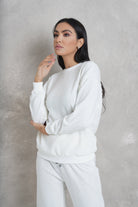 نتشي بلوزة بتطريز بأزراز برقبة دائرية وكم طويل نسائي